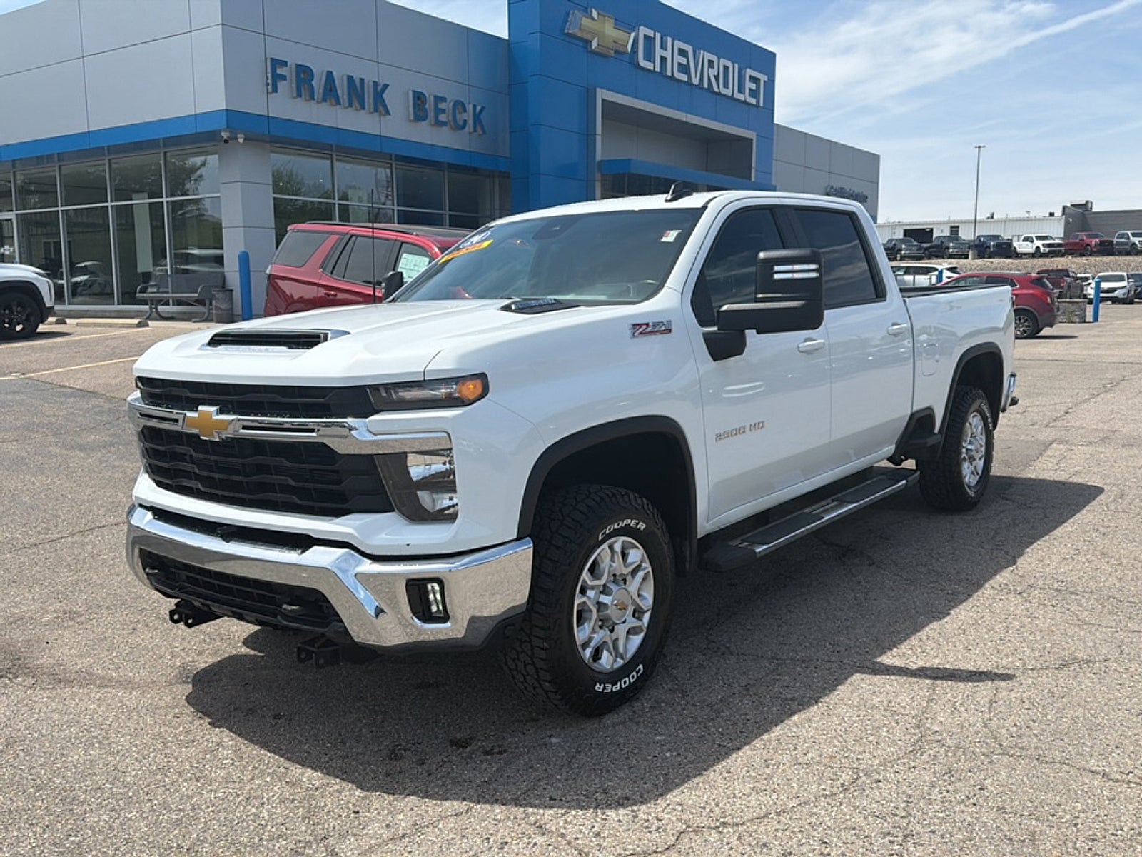 2024 Chevrolet Silverado 2500 HD LT in Summit White — front three-quarter view