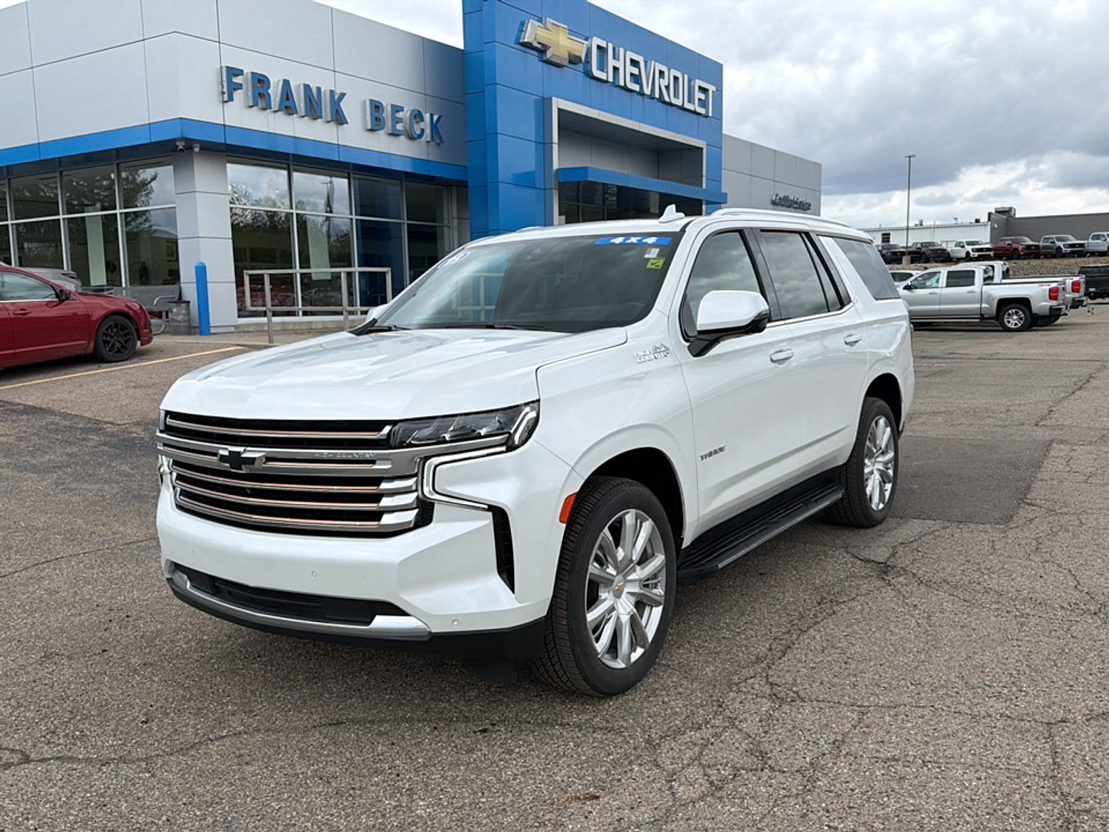 2023 Chevrolet Tahoe High Country in Iridescent Pearl Tricoat — front three-quarter view