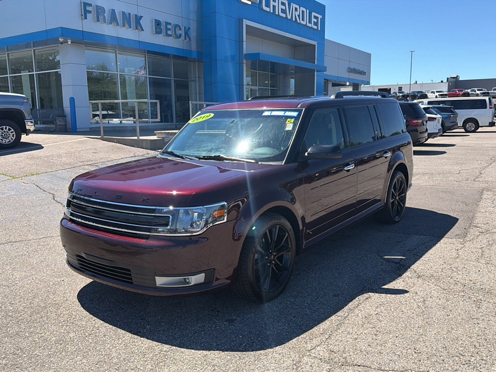 2019 Ford Flex SEL in Red — front three-quarter view