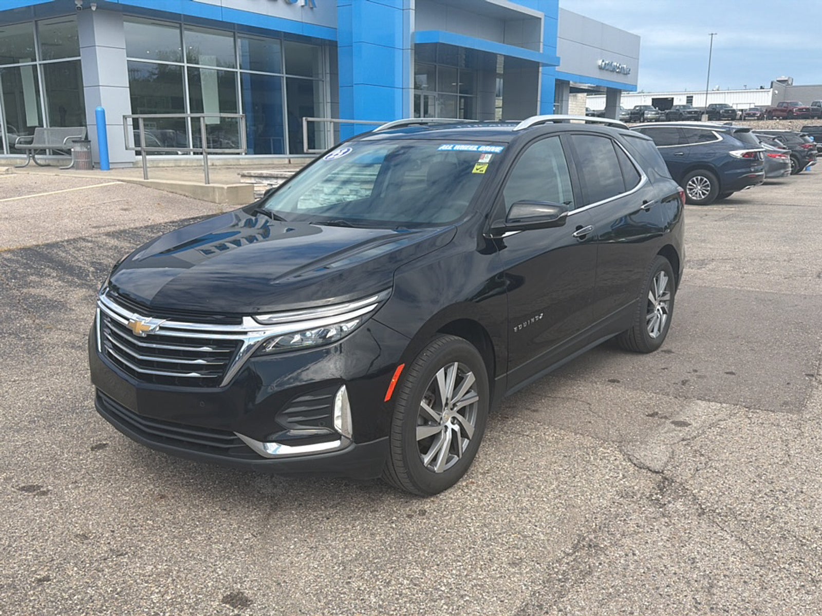 2023 Chevrolet Equinox Premier in Mosaic Black Metallic — front three-quarter view
